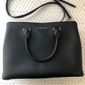 Black Michael Kors sectional handbag with strap